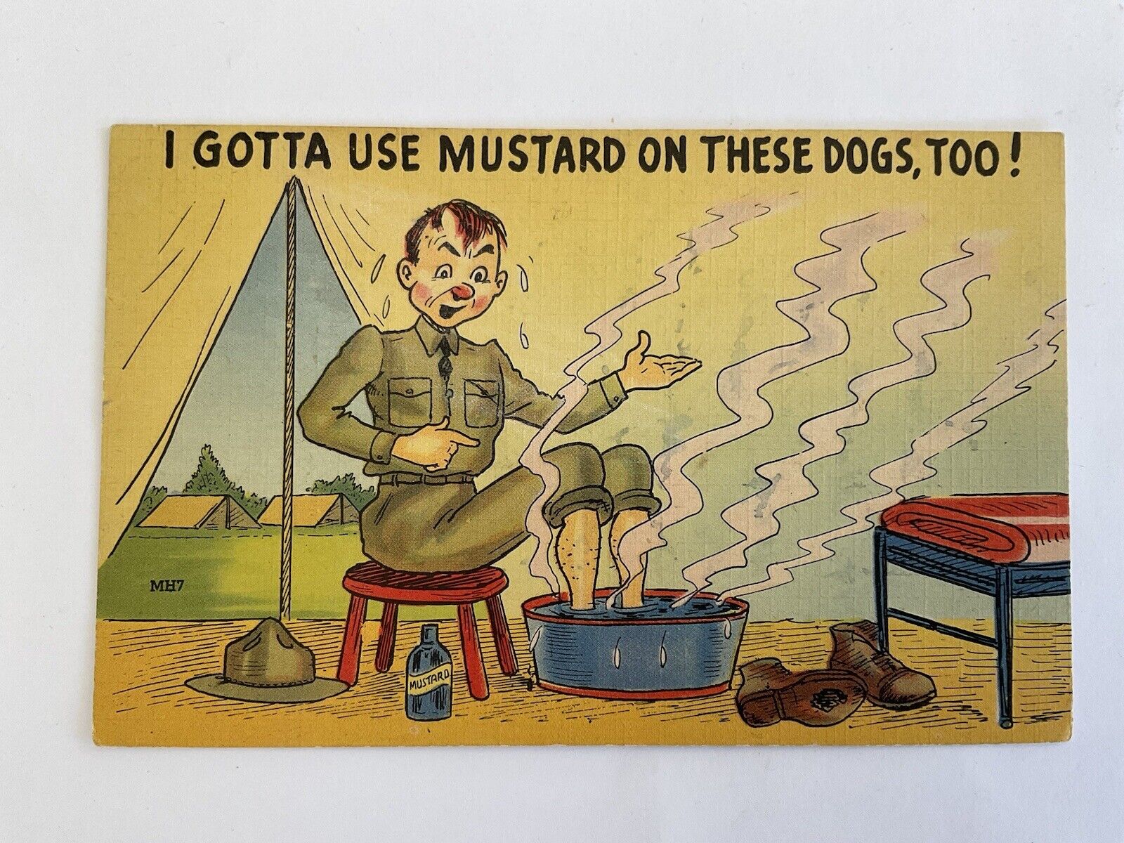 Comic~1943~Army soldier soaks feet~I gotta use mustard on these dogs too~WWII