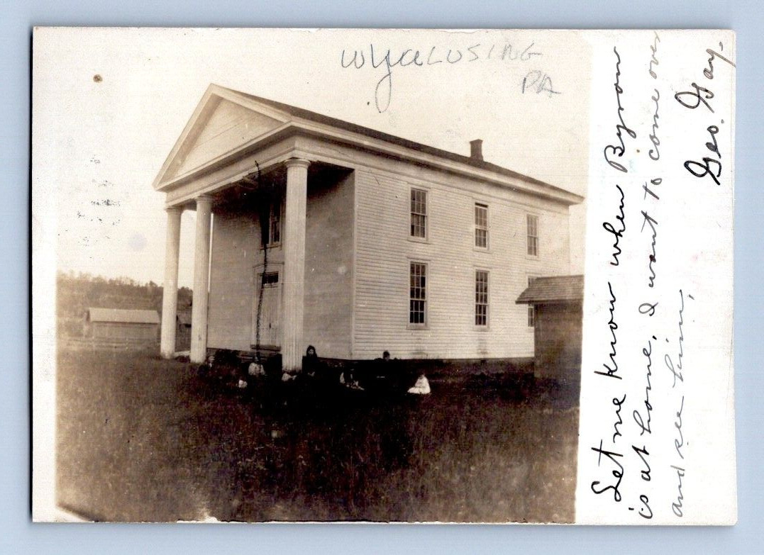 RPPC 1907. WYALUSING, PA. BOARDING HOUSE, SCHOOL HOUSE. (TRIMMED). POSTCARD 1A36