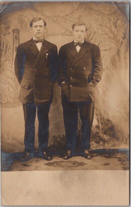 1908 Studio Photo RPPC Postcard Two Young Men, Brothers in Matching Suits Twins?