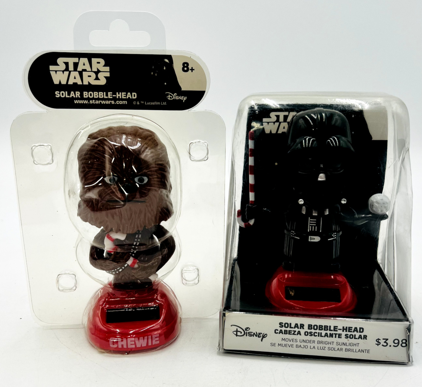 New Never Opened.  Darth Vader and Chewbacca Disney Solar Bobblehead 2018