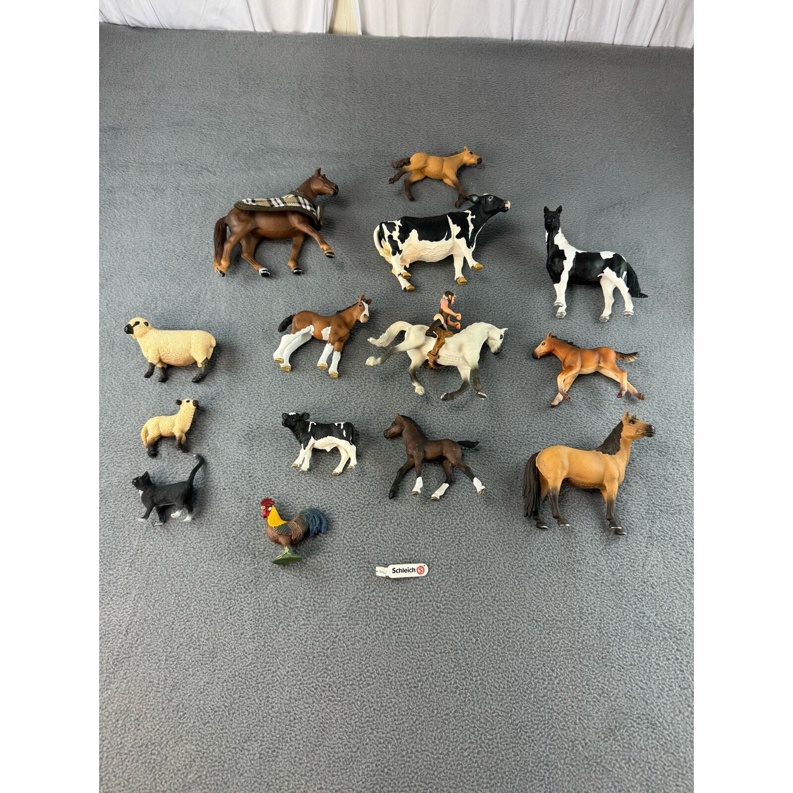Lot of 14 schleich  horses cows and assorted farm animals 