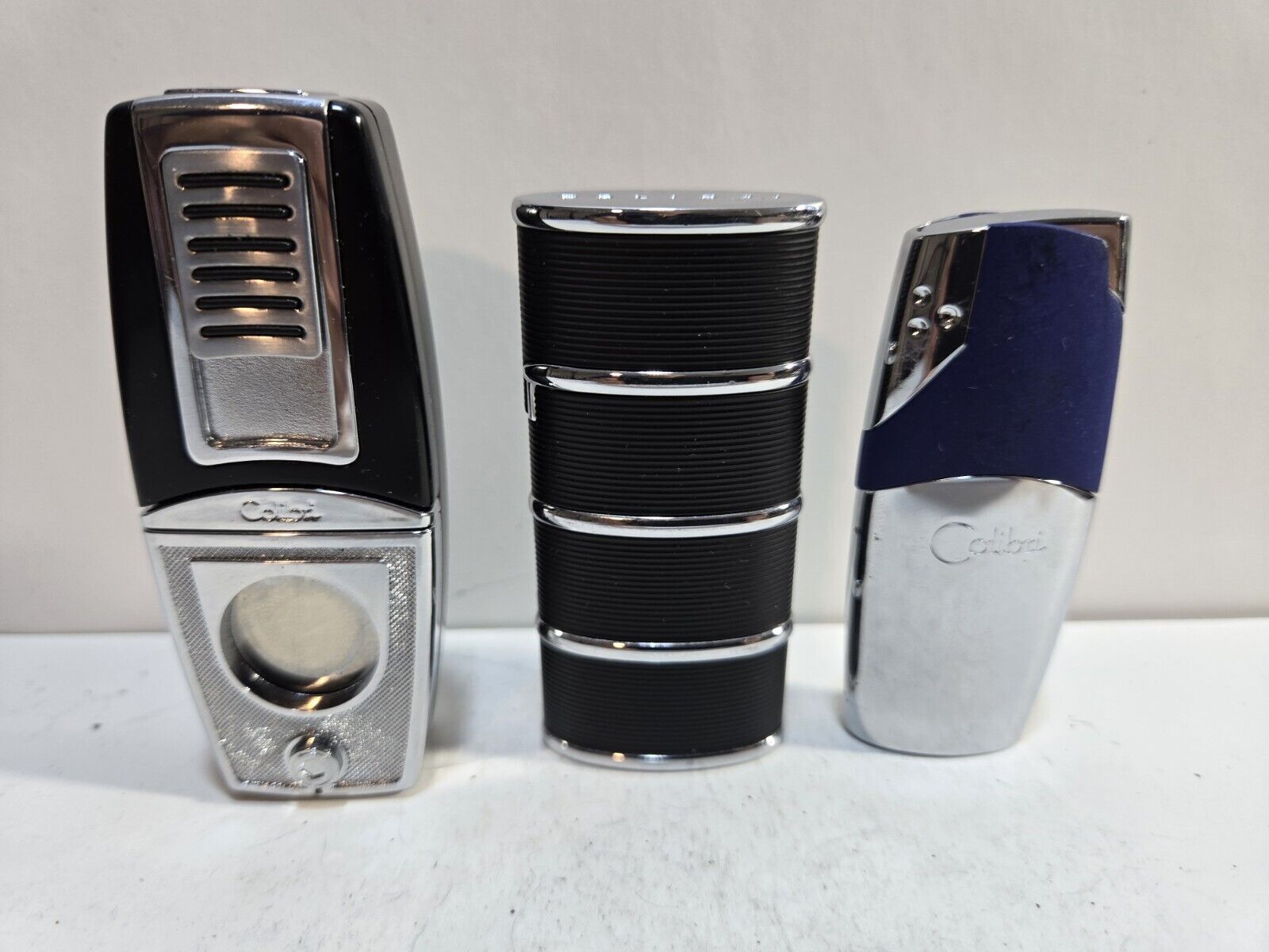 LOT OF 3  VINTAGE COLIBRI LIGHTERS     collect   / display   7010/8