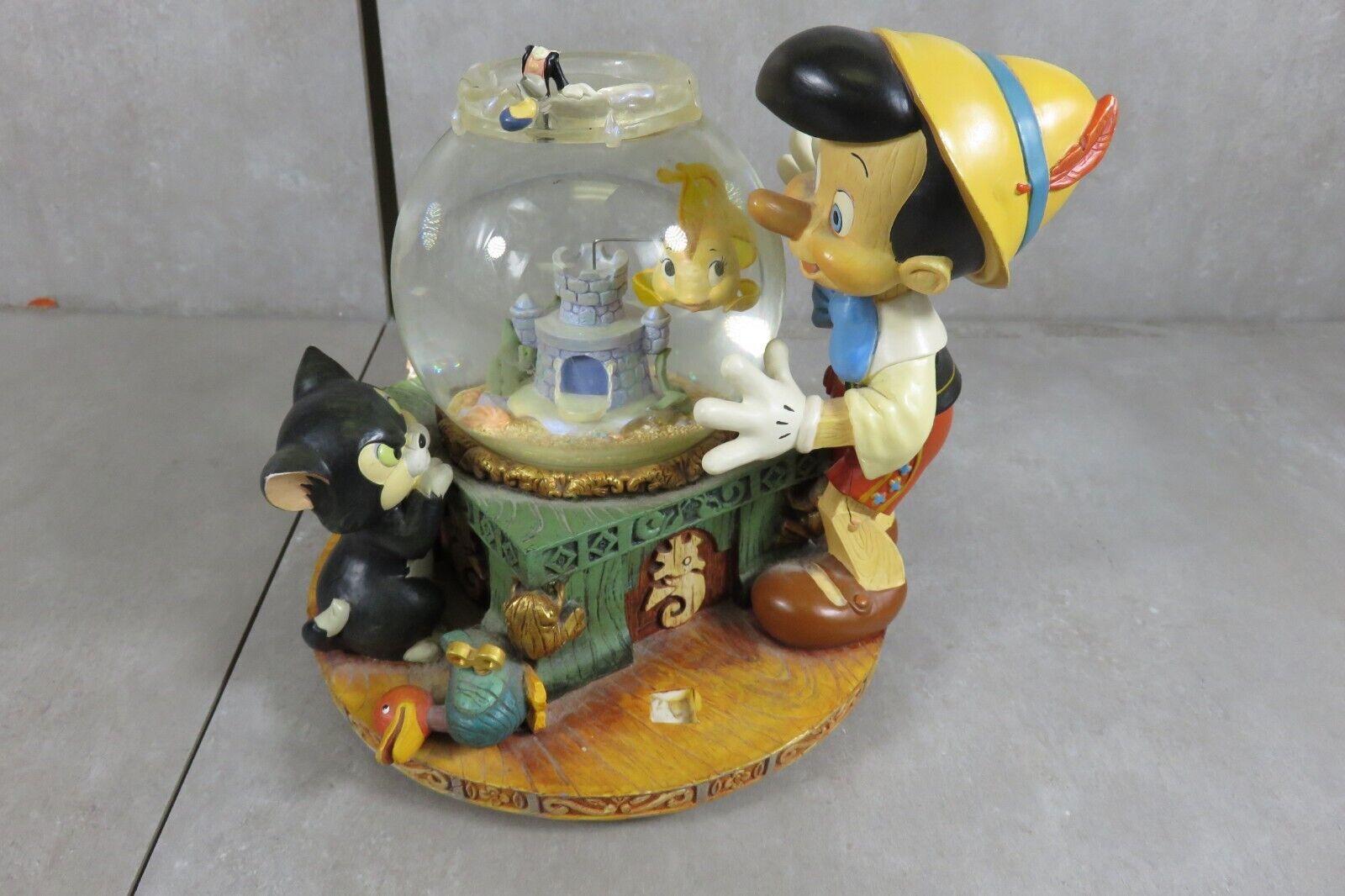 Disney Pinocchio Toyland Musical Snow Globe, DAMGE, READ DESCRIPTION