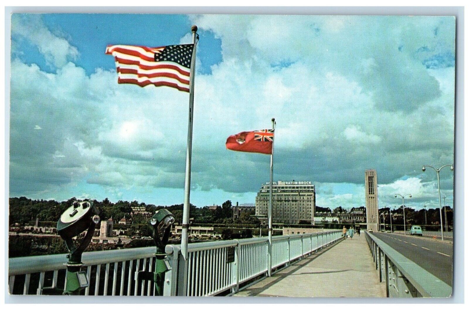 c1950\'s Entering Canada Rainbow Bridge Flags Niagara Falls Canada Postcard