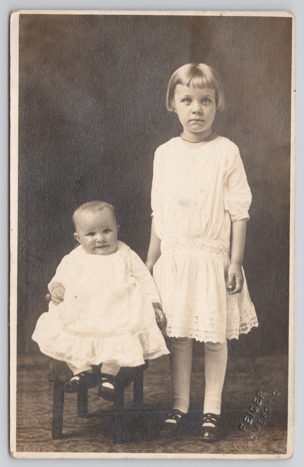 RPPC Little Girl With Baby Sister In Studio c1910 Real Photo Postcard