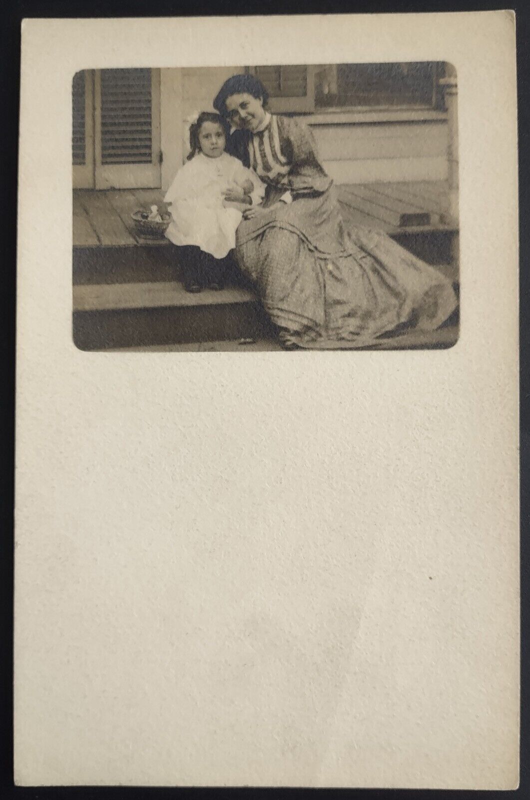 RPPC Mother Daughter Sitting On Steps With Small Basket Velox