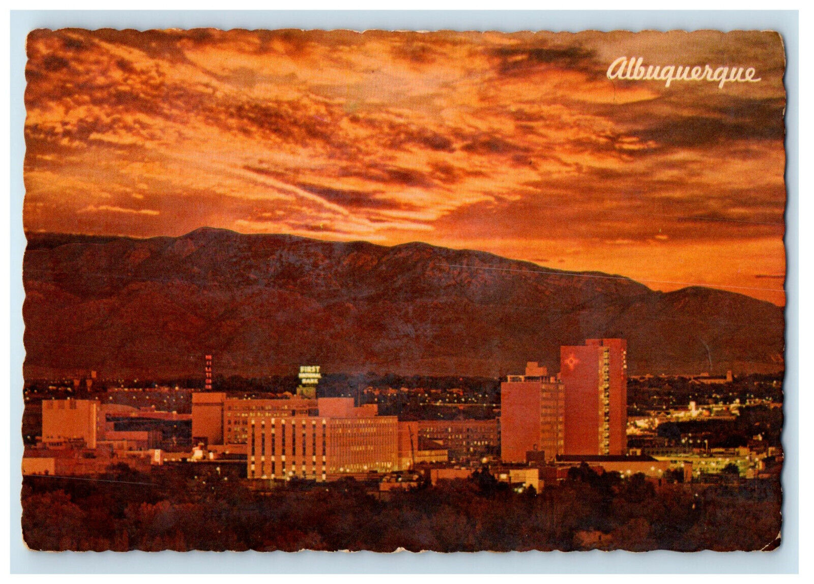 c1950's Night Falls Over This Largest City in New Mexico Albuquerque NM Postcard