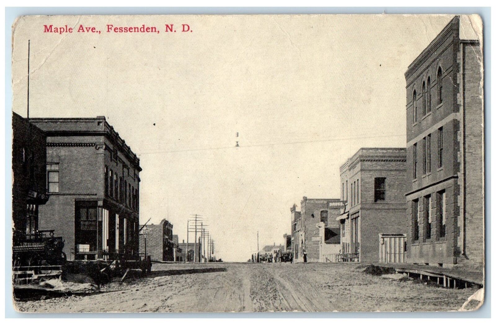 c1910's Maple Avenue Dirt Road Building Fessenden North Dakota Antique Postcard