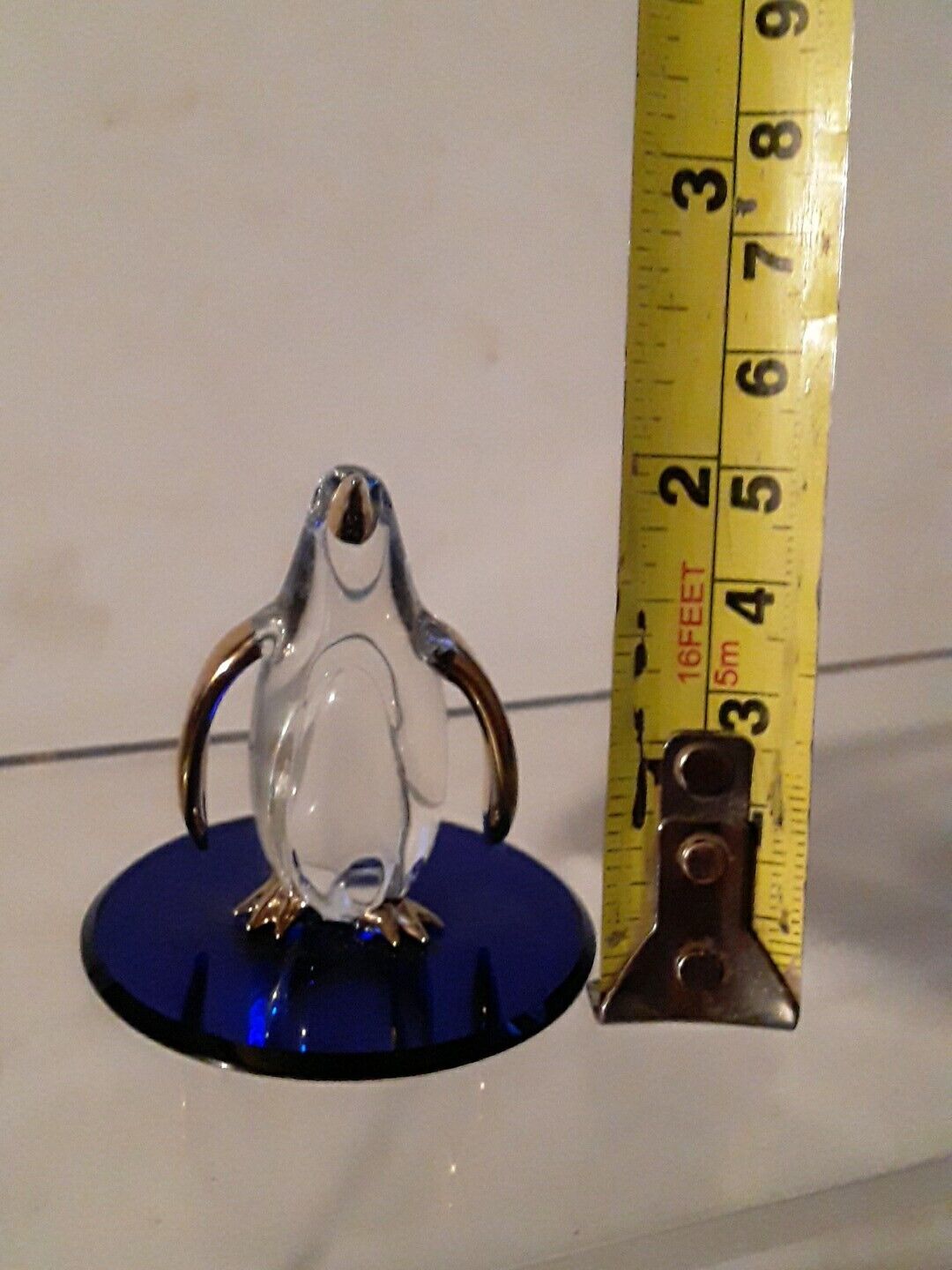 Vintage GLASS BARON Glass Penguin with Gold Accents on Blue Mirror