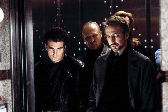 Die Hard Alan Rickman as Hans Gruber leads his team 12x18 Poster