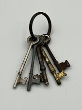 Lot of (5) Assorted Antique Metal Skeleton Keys on Key Ring picture