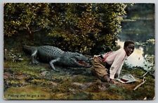 1909 Fishing and He Got a Bite Alligator . Daytona Florida Vintage Postcard picture