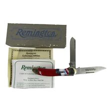 2010 Remington R2253 UMC Double Strike Bullet Knife Red White Blue Swirl picture