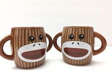 2 Sock Monkey Coffee Mug Cup Double Handles Ceramic Brown 4 inches Tall Galerie  picture