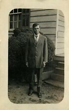RPPC Young Man in Stripe Suit Standing Outside House 1915 Postcard picture