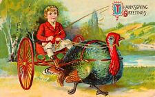 Vintage Thanksgiving Greetings Turkey Pulling Boy in Cart Postcard picture