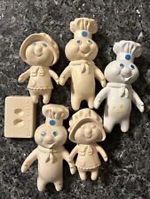 Lot of 5 Pillsbury Doughboy Rubber Dolls (Poppin’ & Poppie Fresh) w/ 1 Stand picture