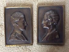 A PAIR OF BRONZE PLAQUES KING AND QUEEN OF BELGIUM SIGNED BY ARTIST A DAUMONT picture