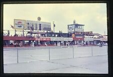 1960's Sebring FL 12 hour 1965 Race fan area with positions board being changed picture