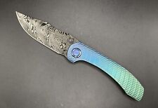 Brian Brown / Reate Knives Raptor M-V2 Fauxmascus Jigged Faded Titanium picture
