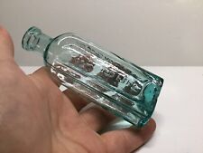 Antique Aqua Colored Lung Tonic Medicine Bottle. picture