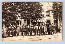 RPPC Large Group of Men in Suits Hats Gather Along Street Real Photo Postcard picture