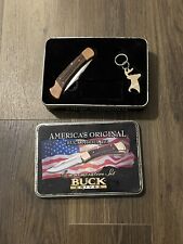 Unused 2005 Buck Knives 110 Commemorative Set Tin with keychain picture