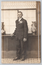 RPPC Young Man Wearing Suit In Studio c1910 Real Photo Postcard picture