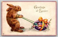 Greetings At Easter Bunny Rabbit Pulling Eggs Post Chewsville MD Embossed C 1918 picture
