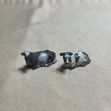 Lot Of 2 Miniature Farm Animal Cows Laying Down Vintage Train Scale 1” Long  picture
