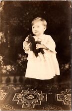 Real Photo Postcard Young Child Holding a Teddy Bear Outside~134632 picture