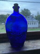 antique floral embossed flask with cork cobalt blue picture