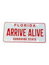 Florida Arrive Alive ORANGE White Booster License Plate Sunshine State FHP Tpr picture