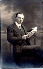RPPC Handsome Man Reading- 1914 Portrait Photo Postcard Jas. Cruden Photography picture