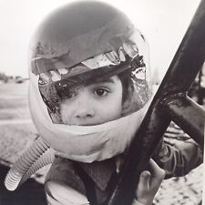 Vintage Press Photo Adorable Boy Odd Helmet Suit Costume Strange Art Snapshot picture