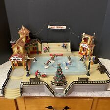 LEMAX Animated Parkside Ice Skating Plaza Rink Christmas Village - NEEDS REPAIR picture