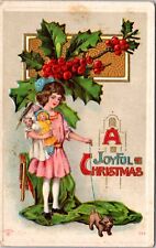 Christmas Girl Holding Dolls Puppy Dog Pink Dress c1915 Embossed postcard P1 picture