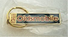 Vintage Oldsmobile Olds Rocket Brass Car Logo Key Chain 1970's NOS New Unopened picture