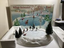 Department 56 Village Animated Winter Figure Skating Pond - Tested - Complete picture