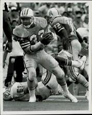1986 Press Photo Mike Rosier carries the ball in game Houston at Miami picture