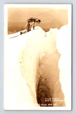 RPPC Hiker Peers Into Snowy Chasm Government Camp Mt. Hood Oregon OR Postcard picture