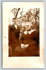 RPPC Grandma Sits with Grandson Standing By AZO 1904-1918 ANTIQUE Postcard 1336 picture