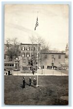 c1910 American Flag Raising Horse Wagon Streetcar Trolley RPPC Photo Postcard picture