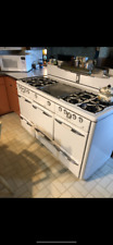 vintage roper gas stove with 8 cast iron burners oven and warming drawer  picture