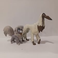 2 resin dog figurines 