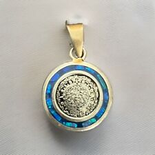 Unique Mexican Pendal: Striking Blue Stone Accented with Steelwork picture