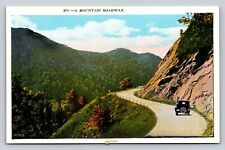 A Mountain Roadway With Classic Car VINTAGE Postcard picture