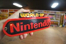 RARE WORLD OF NINTENDO DEALER PORCELAIN METAL SIGN GAMING MARIO KMART NES SNES picture