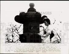 1954 Press Photo Diplomat Tutsuko Iguchi's daughter lights Japanese lantern, DC picture