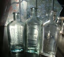 ANTIQUE LOT OF THREE EMBOSSED MEDICINE REMEDY BOTTLES picture